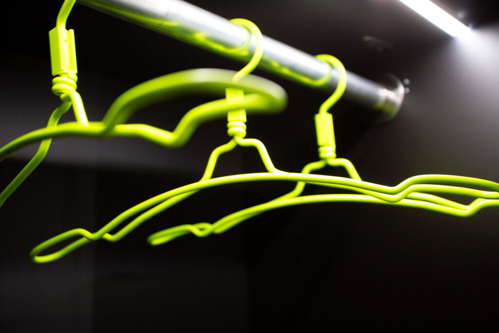 Close up of neon hangers in The Circle Berlin.