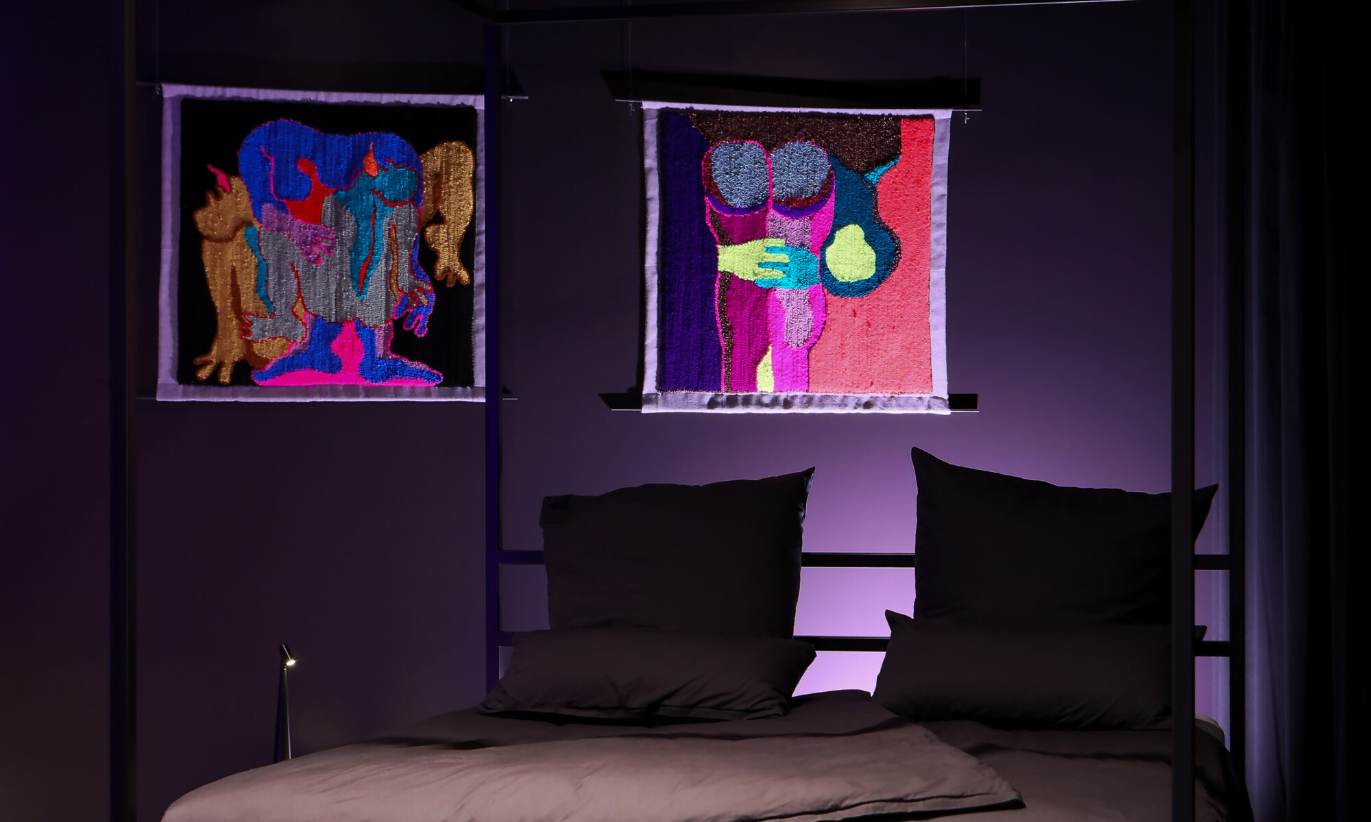 The custom-made, four-poster, kingsized bed in the bedroom of The Circle Berlin, featuring artwork by Florencia Martina.