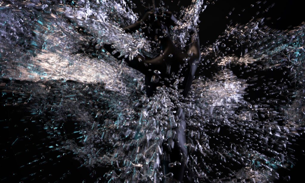 Dark figure splashed by water.