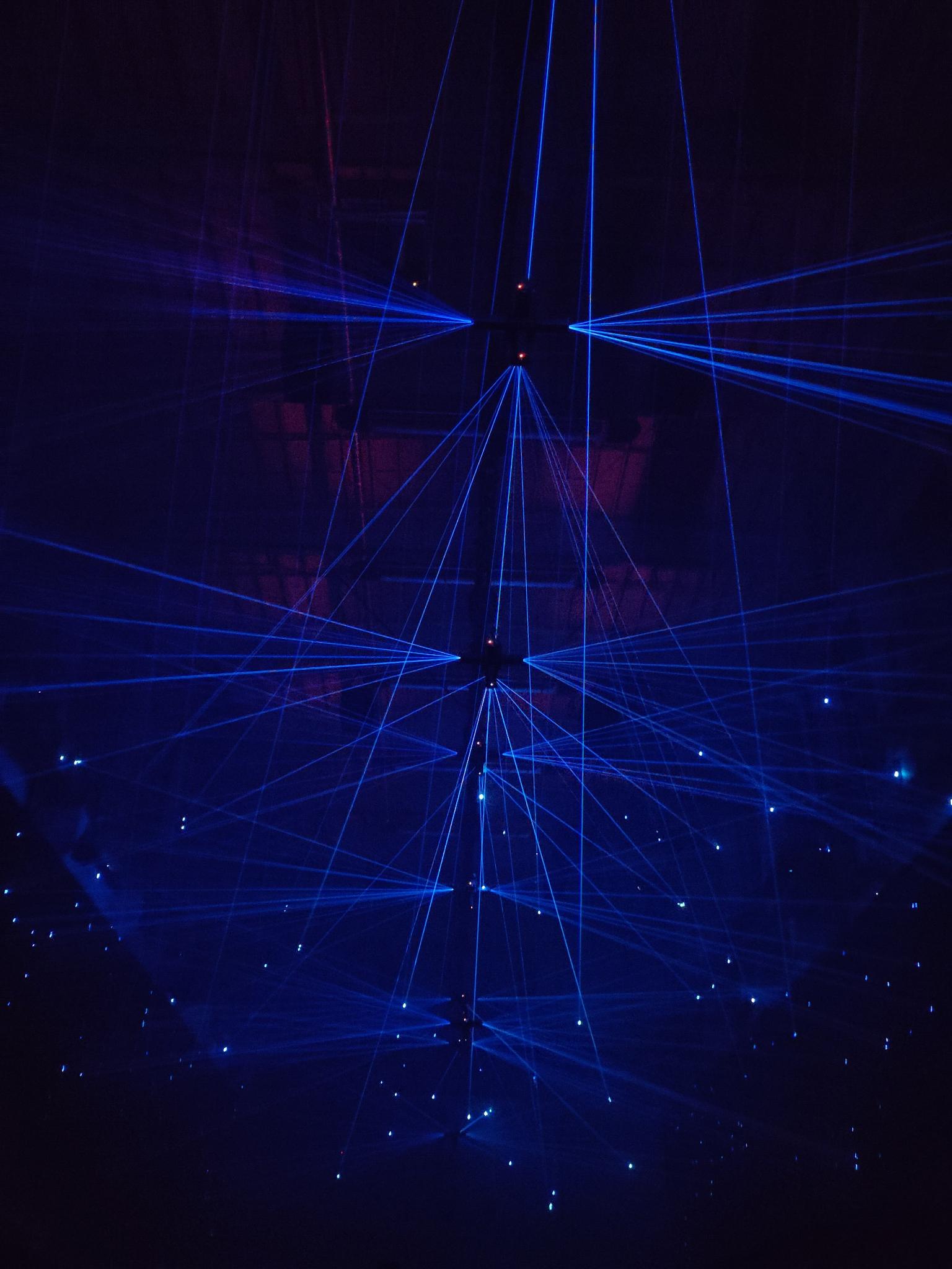 Blue and black ambient lights at Kraftwerk Berlin exhibition by Dark Matter artists, creating immersive sensory design.